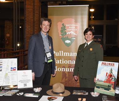 National Park Service ranger and attendee at the Pullman National Monument booth. 